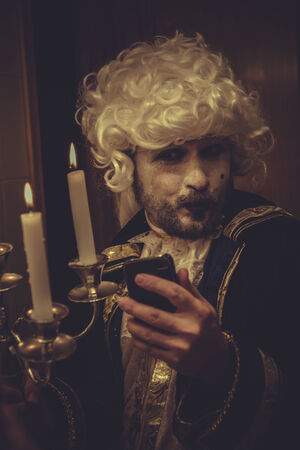 Selfie, man with white wig and candlestick nineteenth centuryの写真素材