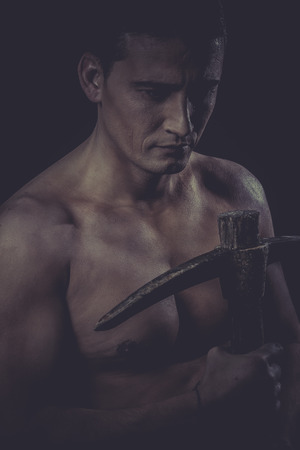 Professional, Construction worker portrait holding a peak.の写真素材
