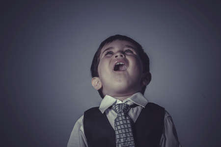little business boy over grey の写真素材