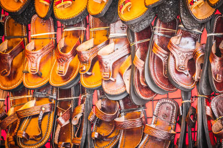 Leather craft stalls in a medieval fairの写真素材