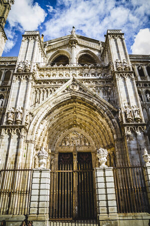 majestic Cathedral of Toledo Gothic style, with walls full of religious sculpturesの写真素材