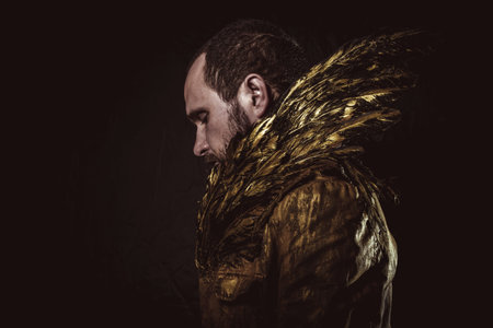 Steampunk, man beard and suit made with golden wings