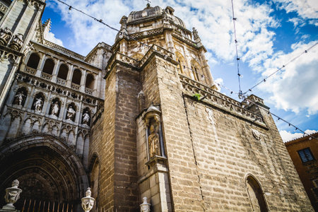 majestic Cathedral of Toledo Gothic style, with walls full of religious sculpturesの写真素材