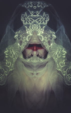 man with white lace veil, mystery, nightmaresの写真素材