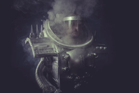 cosmonaut, spaceman in silver armor and huge cannonの写真素材