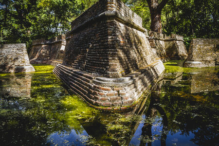 environment, building in ruins on a green swamp with waterの写真素材