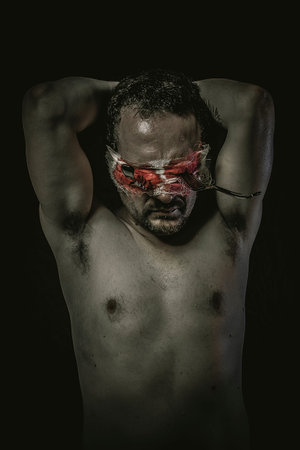 nightmare, fear, depression, man with his eyes fixed on holdersの写真素材