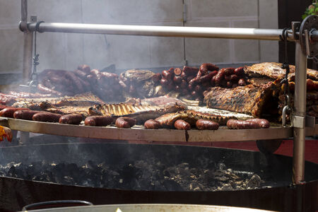 barbecue with sausages and pork sausagesの写真素材