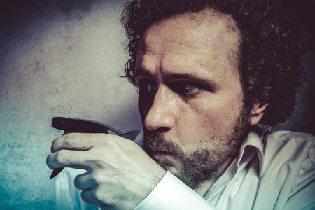 Clean, businessman with a spray, cleaning, man in white shirt with funny expressionsの写真素材