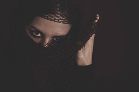 hijab, woman in traditional Islamic veil, burka, beautiful and deep lookの写真素材