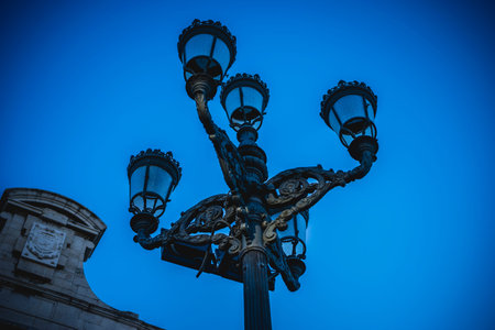 Street lamp, oldest street in the capital of Spain, the city of Madrid, its architecture and artの写真素材