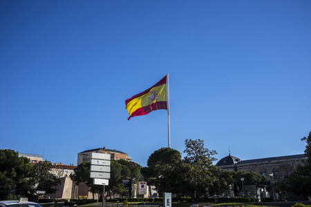 Spanish flasg, plaza colon monument in the capital of Spain, Madridのeditorial素材