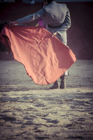 Entertainment, spectacle of bullfighting, where a bull fighting a bullfighter Spanish traditionの写真素材