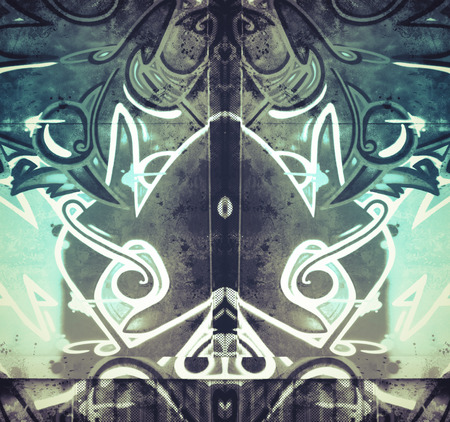 Dirty, geometric shapes painted on an old concrete wallの写真素材