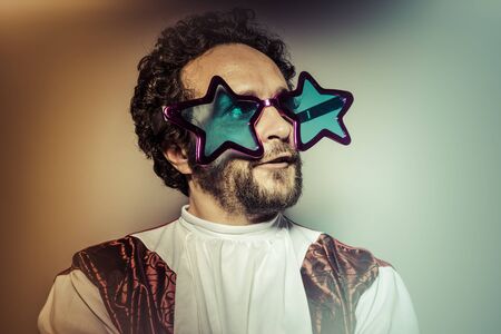 Man with glasses and stupid face huge stars, selfieの写真素材