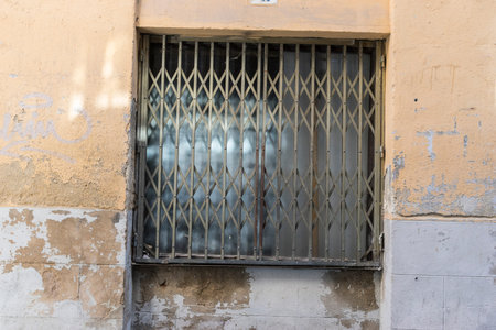 old window iron, closed for business crisesの写真素材