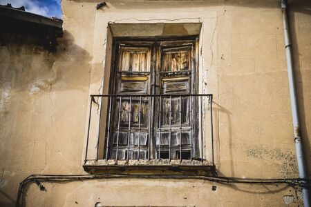 Traditional architecture with balconies and old windows, city of Segovia in Spainの写真素材