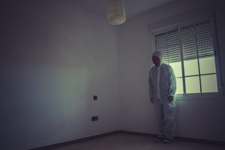 Halloween, mental disorders, man with red mask and white paper suit
