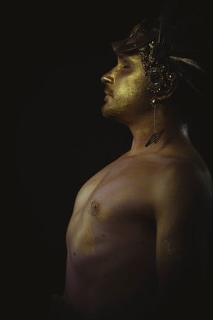 warrior helmet and gold feathers, giant iron swordの写真素材