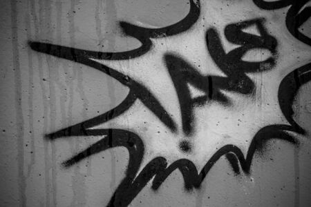 street art grafitti in black and white ink, segment of a dirty wall in the cityの写真素材