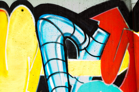 typography and color lines, segment of an urban grafitti on wall