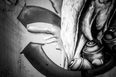 black ink grafitti design in city wall, street art segmentの写真素材