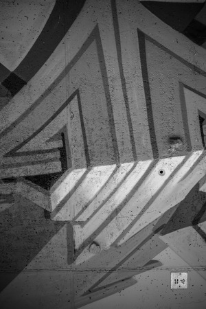 a city wall with graffiti in black and white, urban artの写真素材