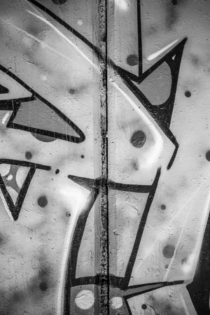 font, a city wall with graffiti in black and white, urban artの写真素材