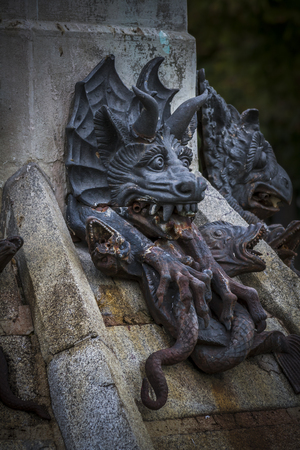guardian, devil figure, bronze sculpture with demonic gargoyles and monstersの写真素材