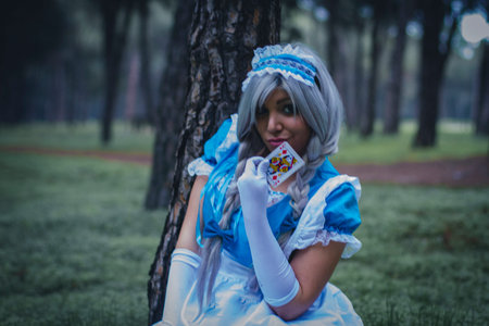 alice in wonderland, girl in a forest with smoke colore and playing cards