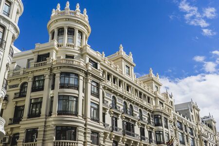 characteristic buildings on the street Gran Via in Madrid, capital of Spain