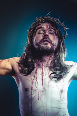Easter jesus christ, son of god representation with crown of thorns and wounds of Calvary skinの写真素材