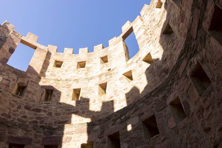 castle with battlements and walls of red stones, VillafamÃ©s rural villa in Castellon, Valencia region in Spainのeditorial素材