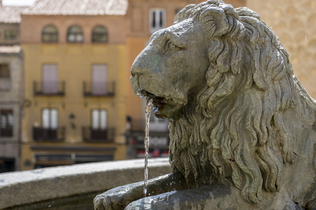 Bronze fountain with lion shape, City of Segovia, famous for its Roman aqueduct, in Spainの写真素材