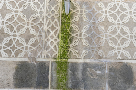 Wall with arabic motifs carved in the rock, City of Segovia, famous for its Roman aqueduct, in Spain