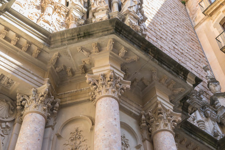 Stone facade of the Montserrat monastery cathedral in Barcelona, Catalonia, Spain