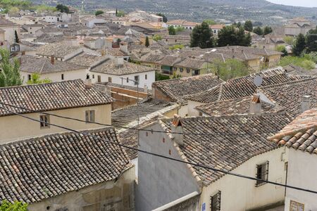 Classic tile roof, Chinchon, Spanish municipality famous for its old medieval square of green color, medieval village tourismの写真素材