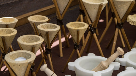 Artisan mortars, traditional kitchen tools at a craft market in spain, europe