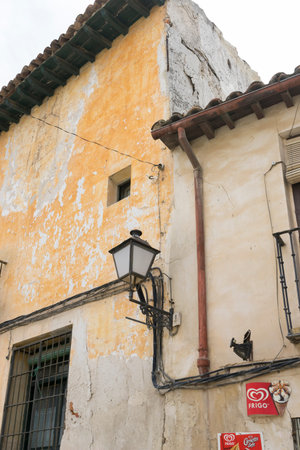Old iron window with wooden edges on a Spanish street. Traditional architecture in spainのeditorial素材