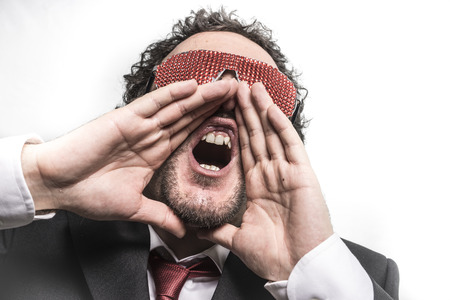 Shoutout, Businessman with red glasses screaming nervously and anxious for moneyの写真素材