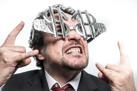 Funny Businessman with glasses in the form of silver dollar, expressions of surprise nerves, stress and powerの写真素材