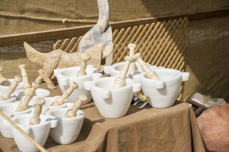 Traditional medieval sculpture tools in an old market in the fiestas of AlcalÃ¡ de Henares, Madrid Spainの写真素材