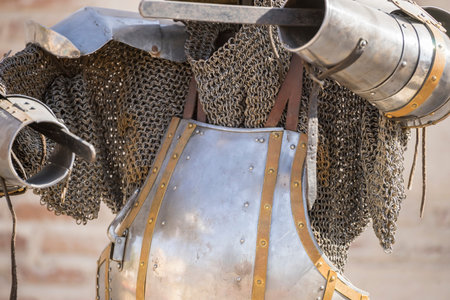 medieval iron armor with helmet and chain mailの写真素材