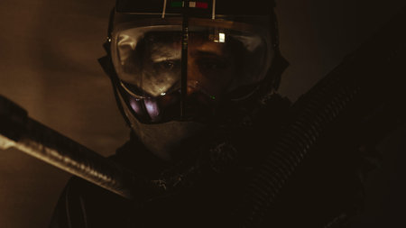 Pilot, man of the future or space with futuristic helmet and fantasy lights, carries a laser weapon...