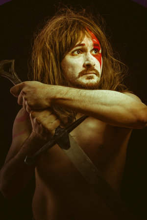 Iron.fighter with sword, medieval warrior mandobleの写真素材