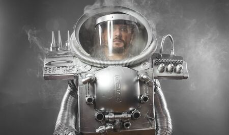 Galaxy astronaut, space man's costume made with cardboard and pieces of recycling, imagination and creativityの写真素材