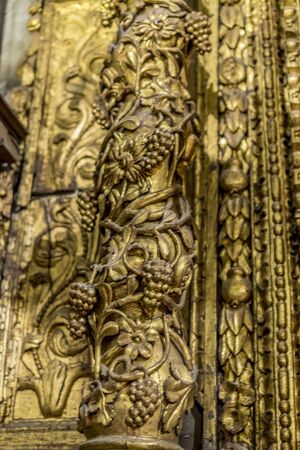 Interior of gothic cathedral in Spain, details of woodwork with gold leafの写真素材