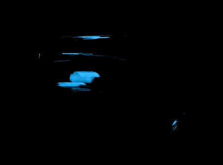 abstract blue background on black background with fractal shapes of varied designsの写真素材