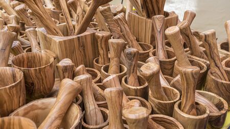 Set wooden utensils for cooks. spoons, mallets, forks and cutlery handmade in handcrafted woodの写真素材