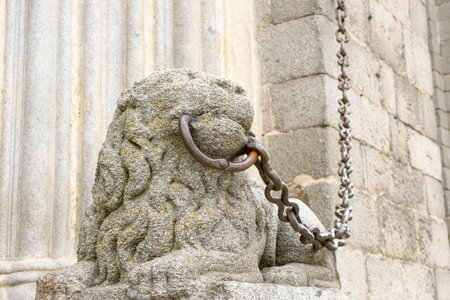 Majestic Stone Lion Sculpture at Ãvila Cathedral in Spainの写真素材